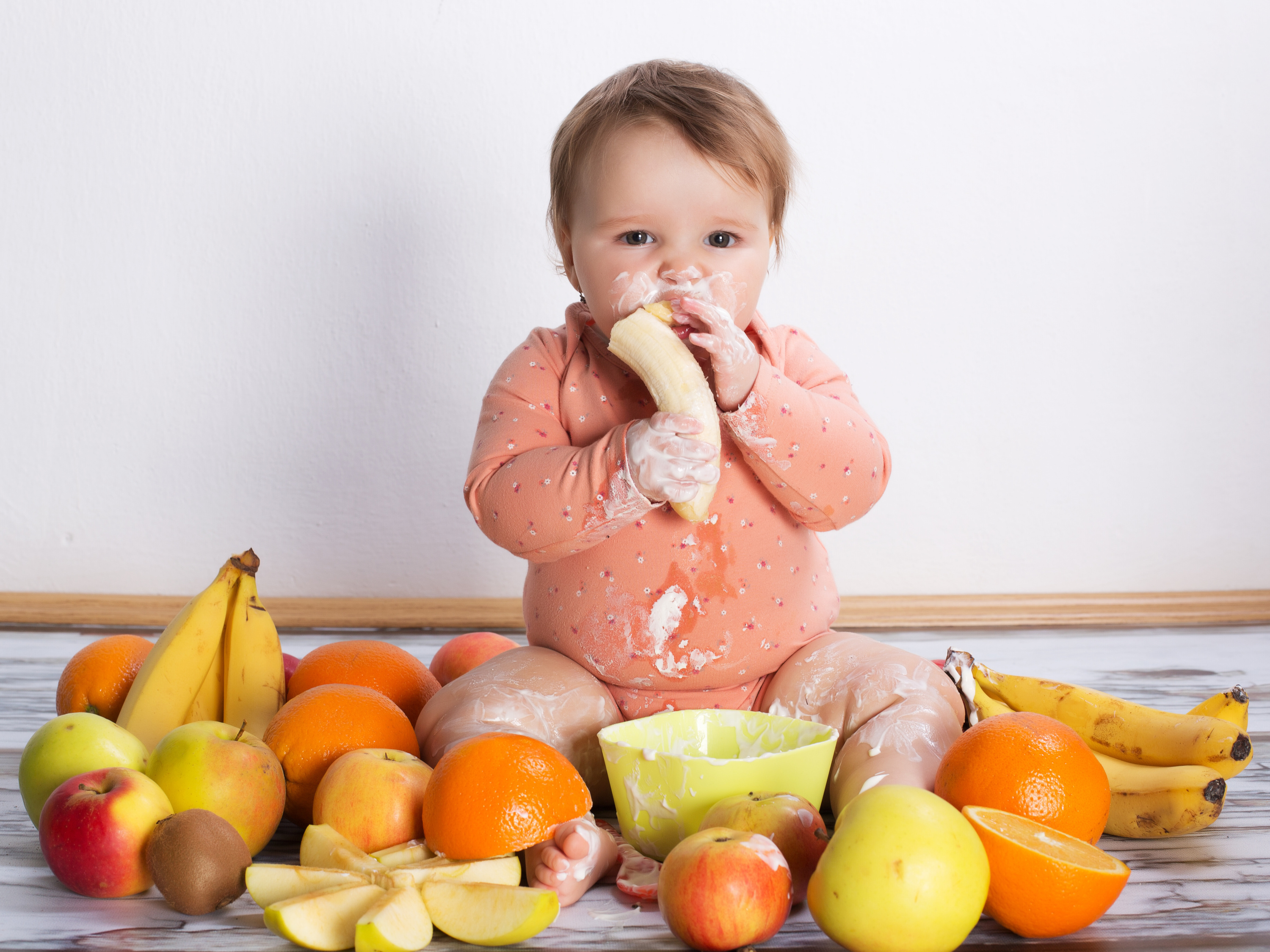 Baby eating fruits